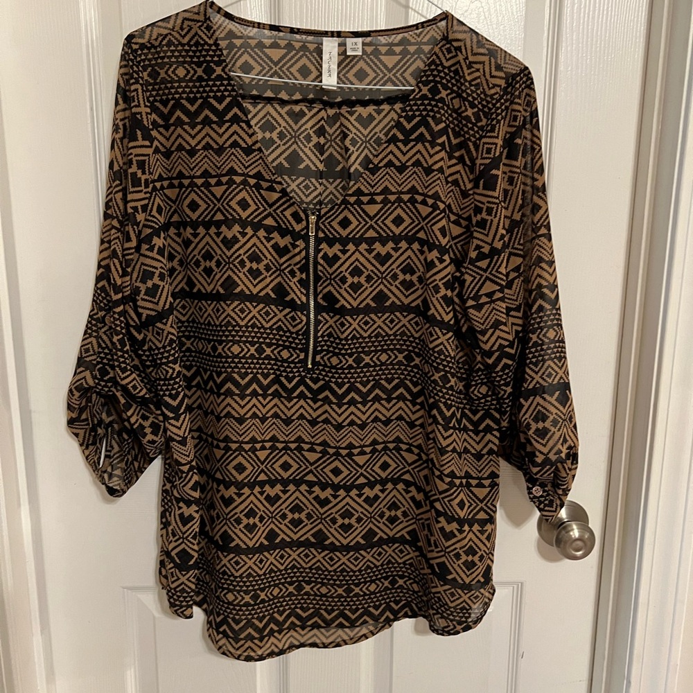 Brown blouse with black design.  1/4 zipper front.  Sleeves can be rolled up.